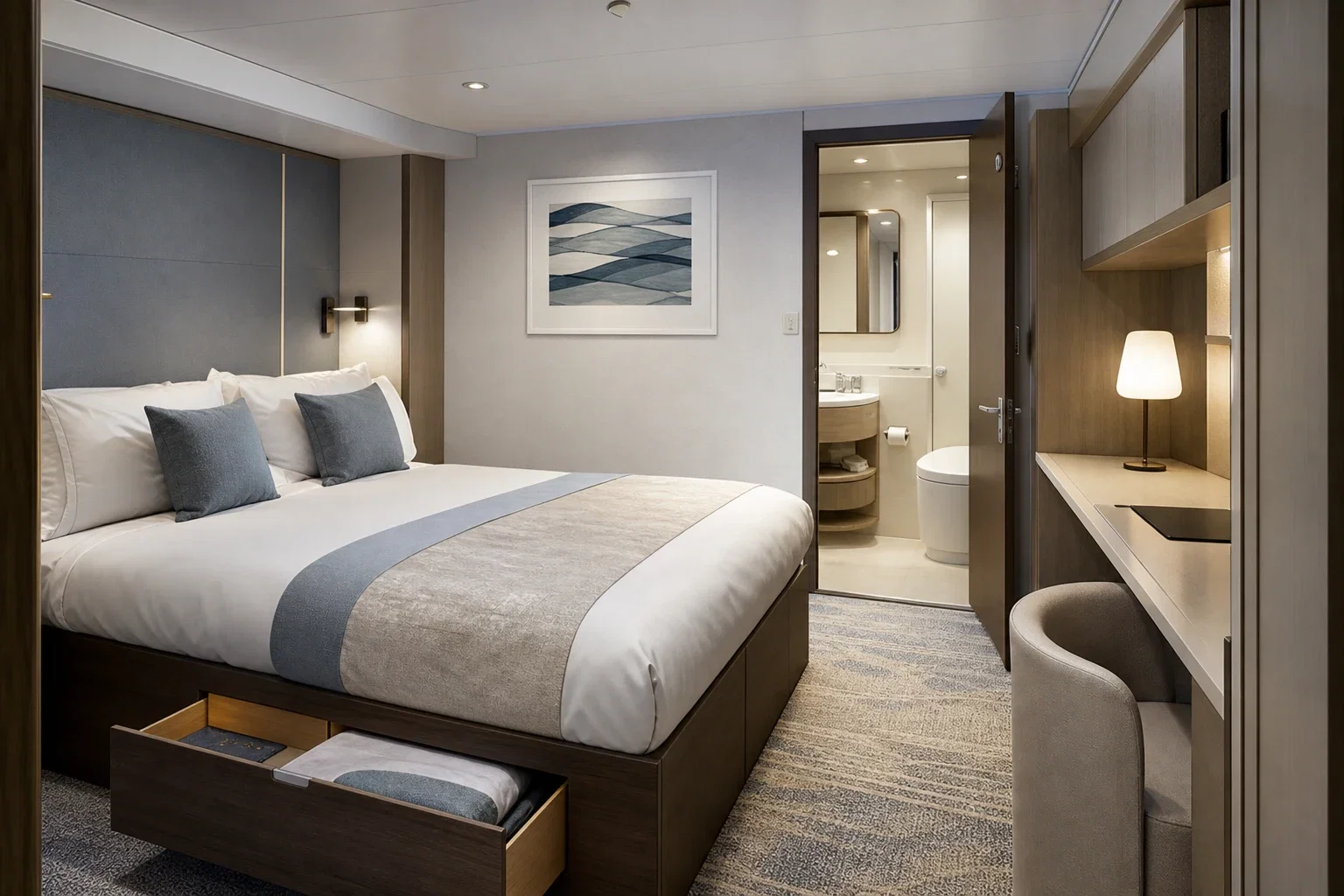 Compact cruise cabin with neatly made bed, smart storage, small desk and balcony door with sea beyond